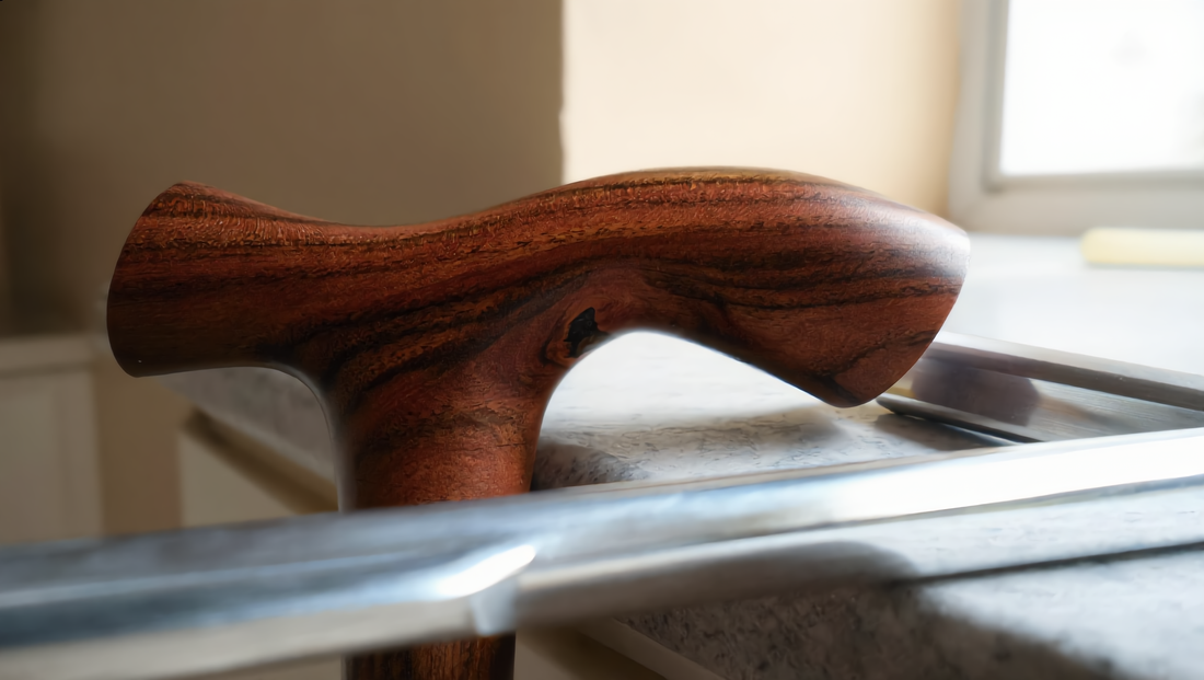 Wooden and aluminum walking canes compared side by side
