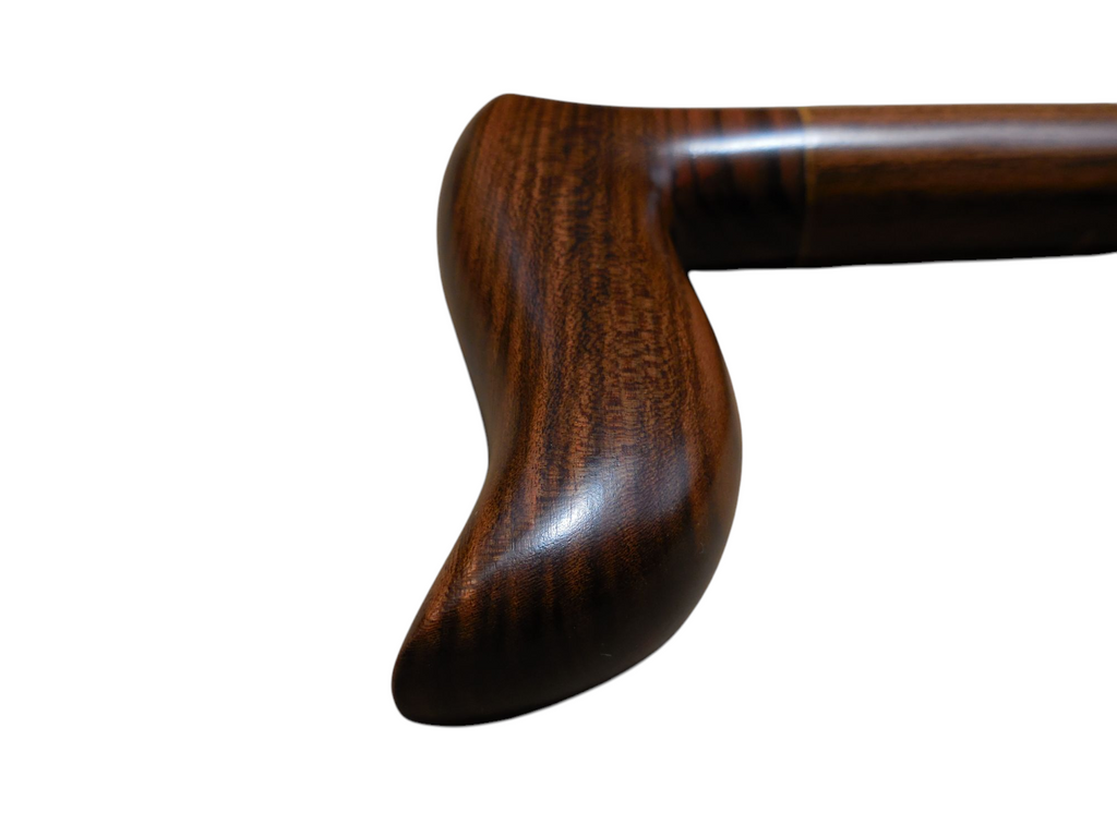Sendero cane handle with the laurel shaft running down to the right