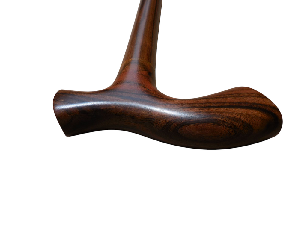 Top-down view of the Tikal cane handle, showing the width of the flared T-top